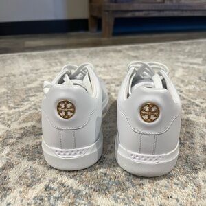 Tory Burch white leather sneakers. Brand new. Never been worn. $80 Size 7.5